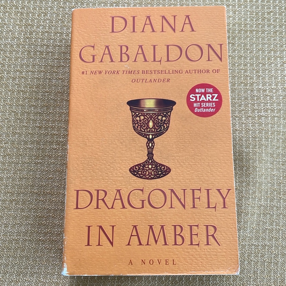 Outlander series by Diana Gabaldon . 3 for 12.